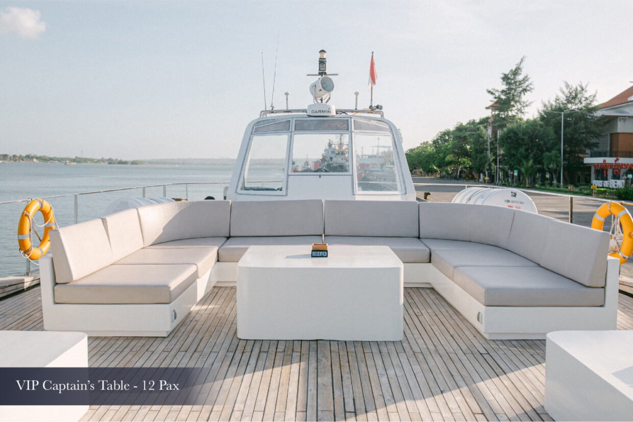VIP Captain's Table lounge seating for 12 on the yacht deck at Benoa