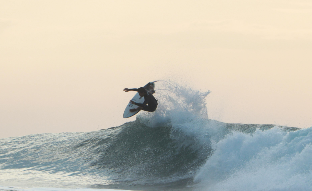surfing in uluwatu