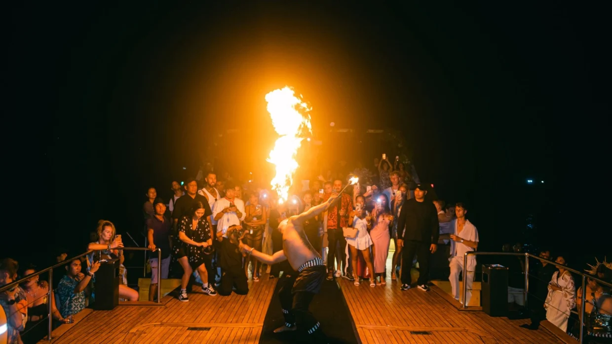 Dynamic pyro dance performance on a yacht corporate gathering