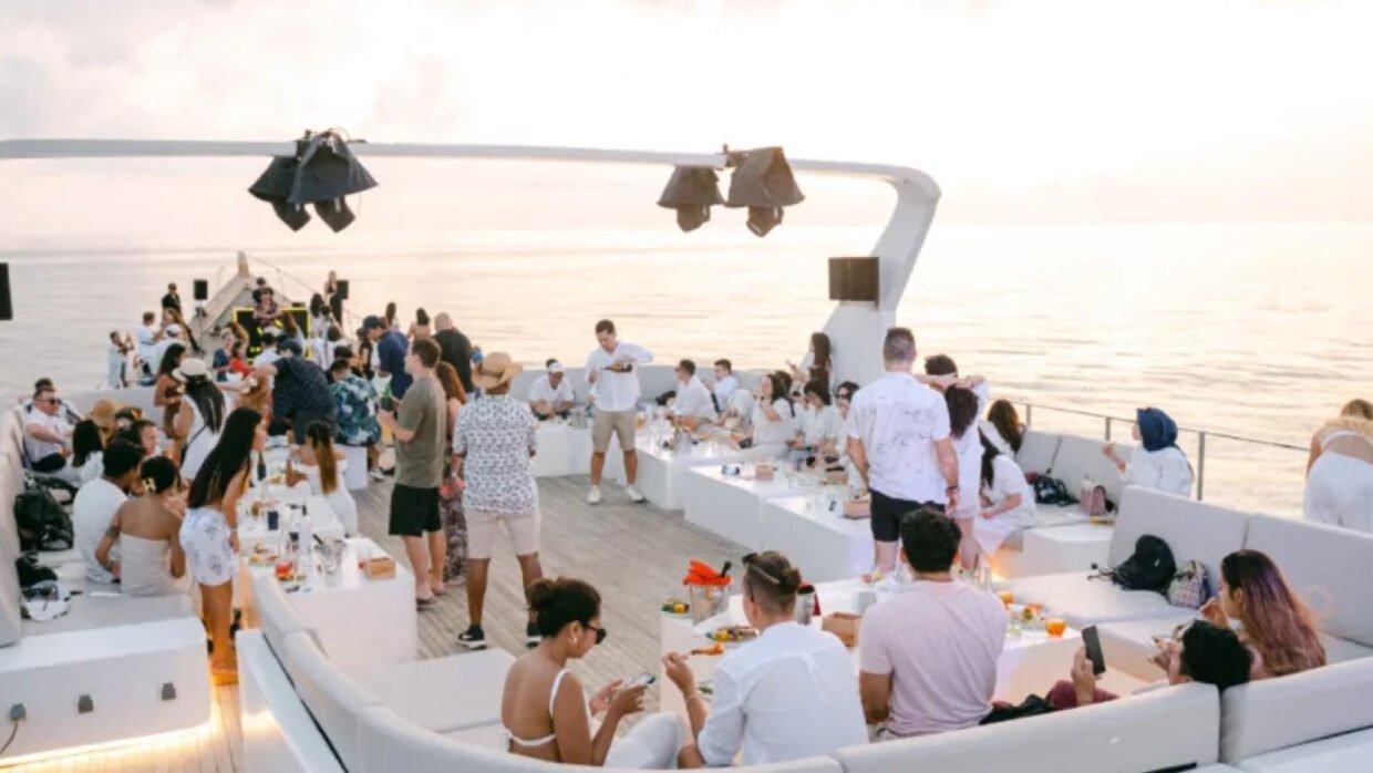 Guests enjoying a yacht party in Bali