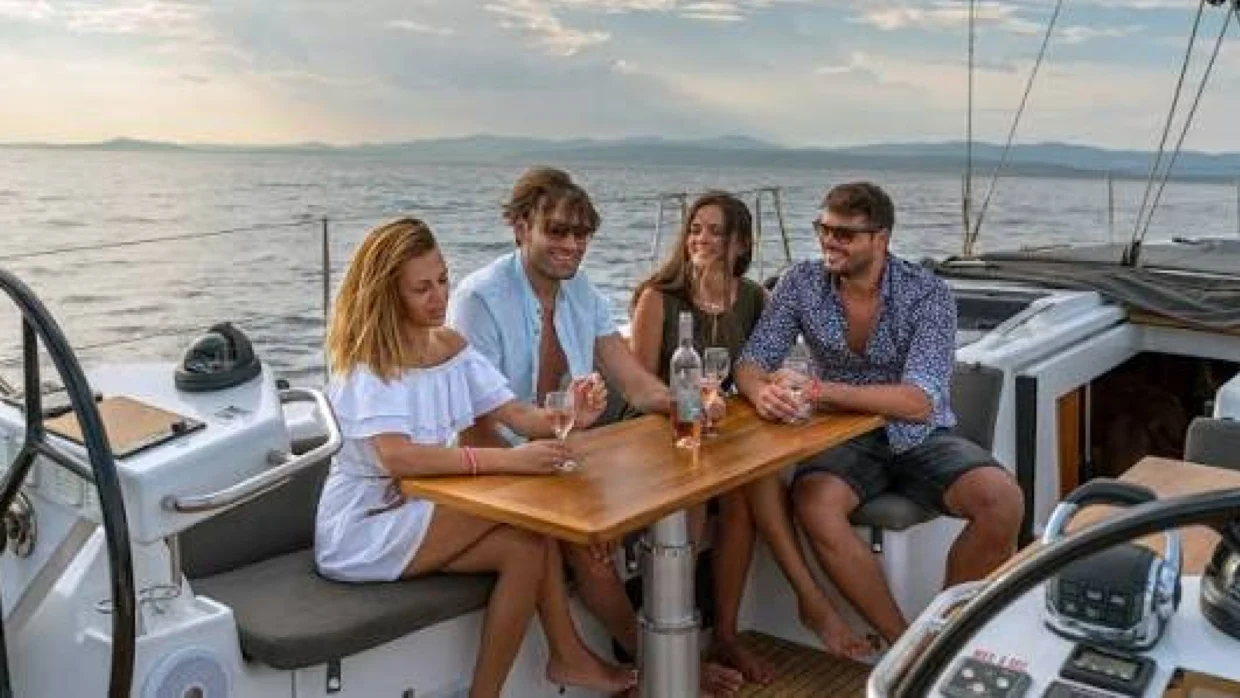 Friends enjoying a daytime yacht trip
